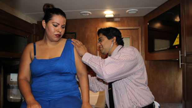 Mobile medical units reach into immigrant communities to provide basic medical care and health screening. 