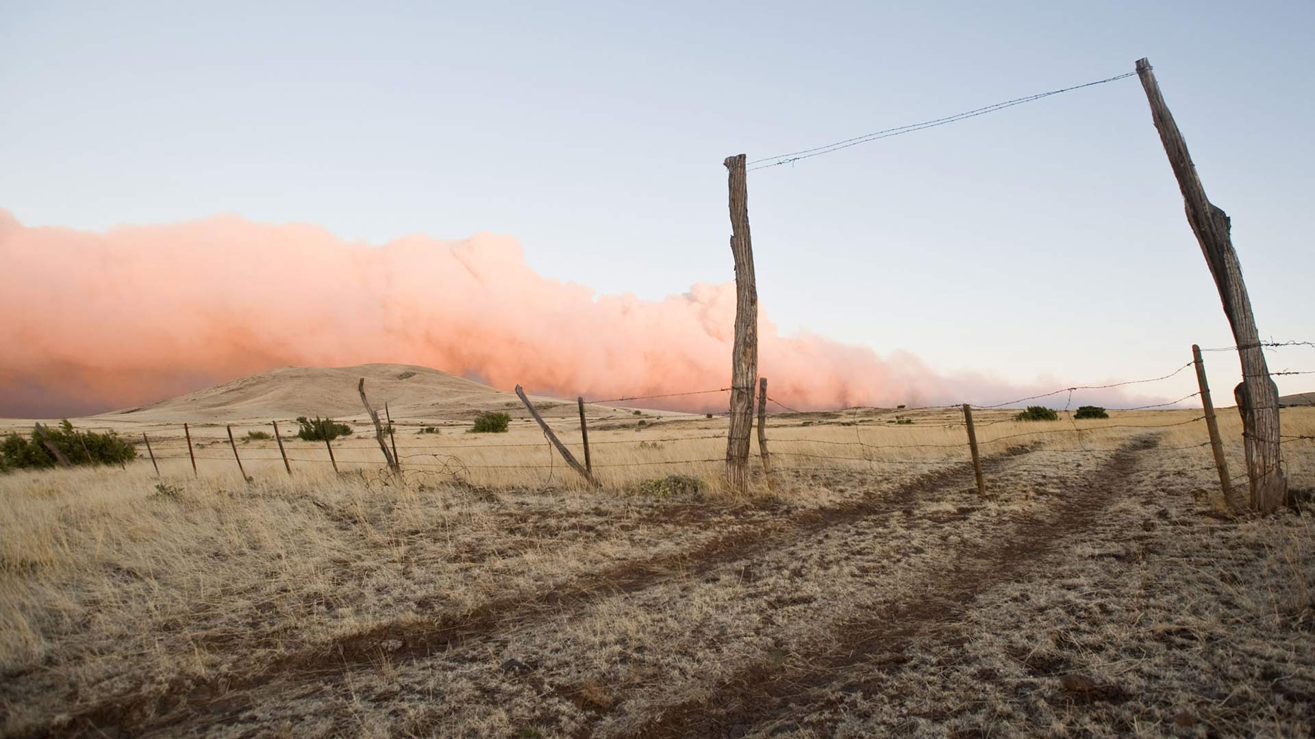 Smoke from a wildfire is lit by the sun in Eastern Arizona.