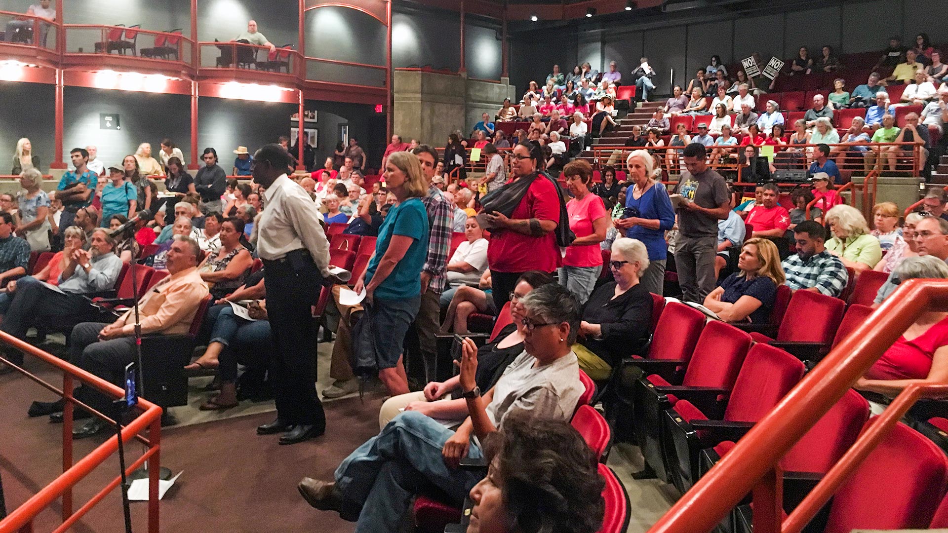 People wait in line to speak about the congressional efforts to repeal and replace the Affordable Care Act, at a town hall hosted by U.S. Rep. Raúl Grijalva, D-Ariz.