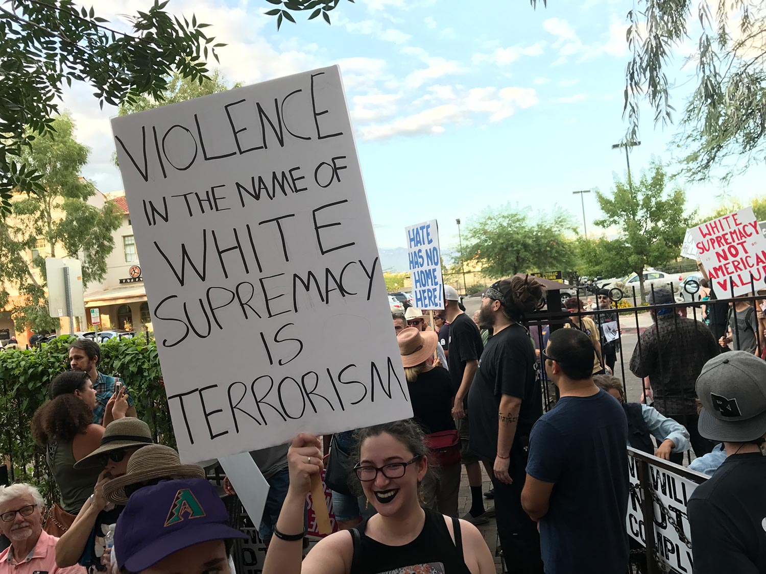 Tucson charlottesville march rally sign