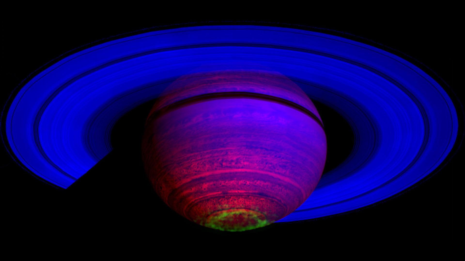 This false-color composite image, constructed from data obtained by NASA's Cassini spacecraft, shows the glow of auroras streaking out about 600 miles from the cloud tops of Saturn's south polar region. The image was taken by the University of Arizona-led Visual and Infrared Mapping Spectrometer.