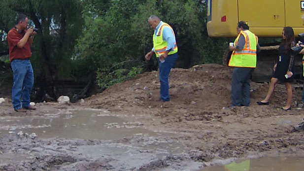 Santa Cruz County officials touring the extent of the damage from the sewer pipe break in Nogales, Arizona. (July, 2017)