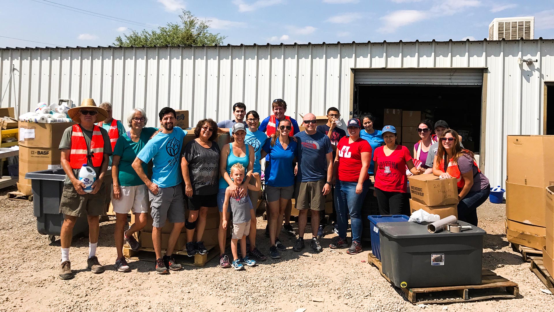 Volunteers with World Care collect supplies for disaster relief.