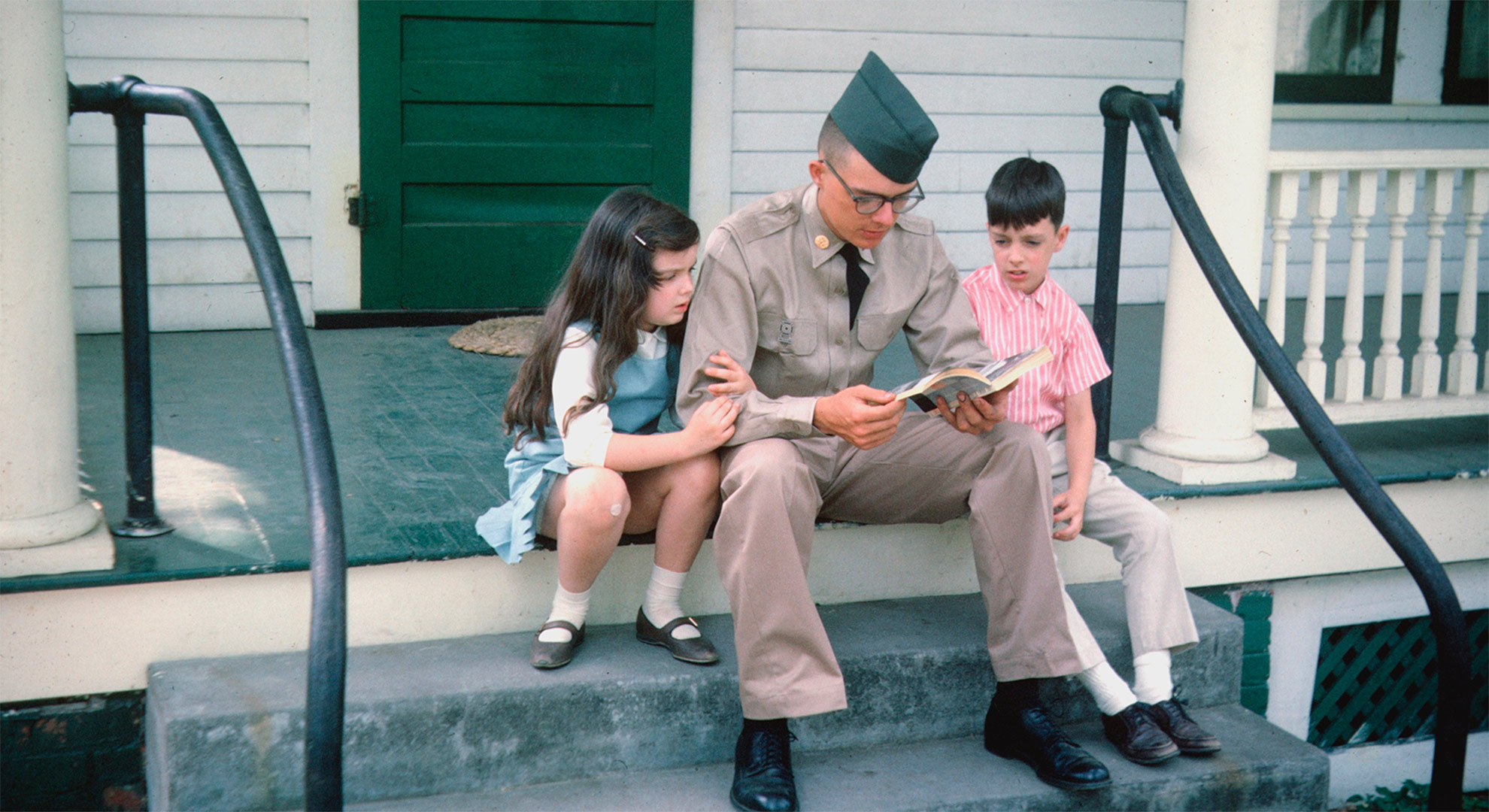 American soldier with his siblings before leaving for Vietnam. 1965.