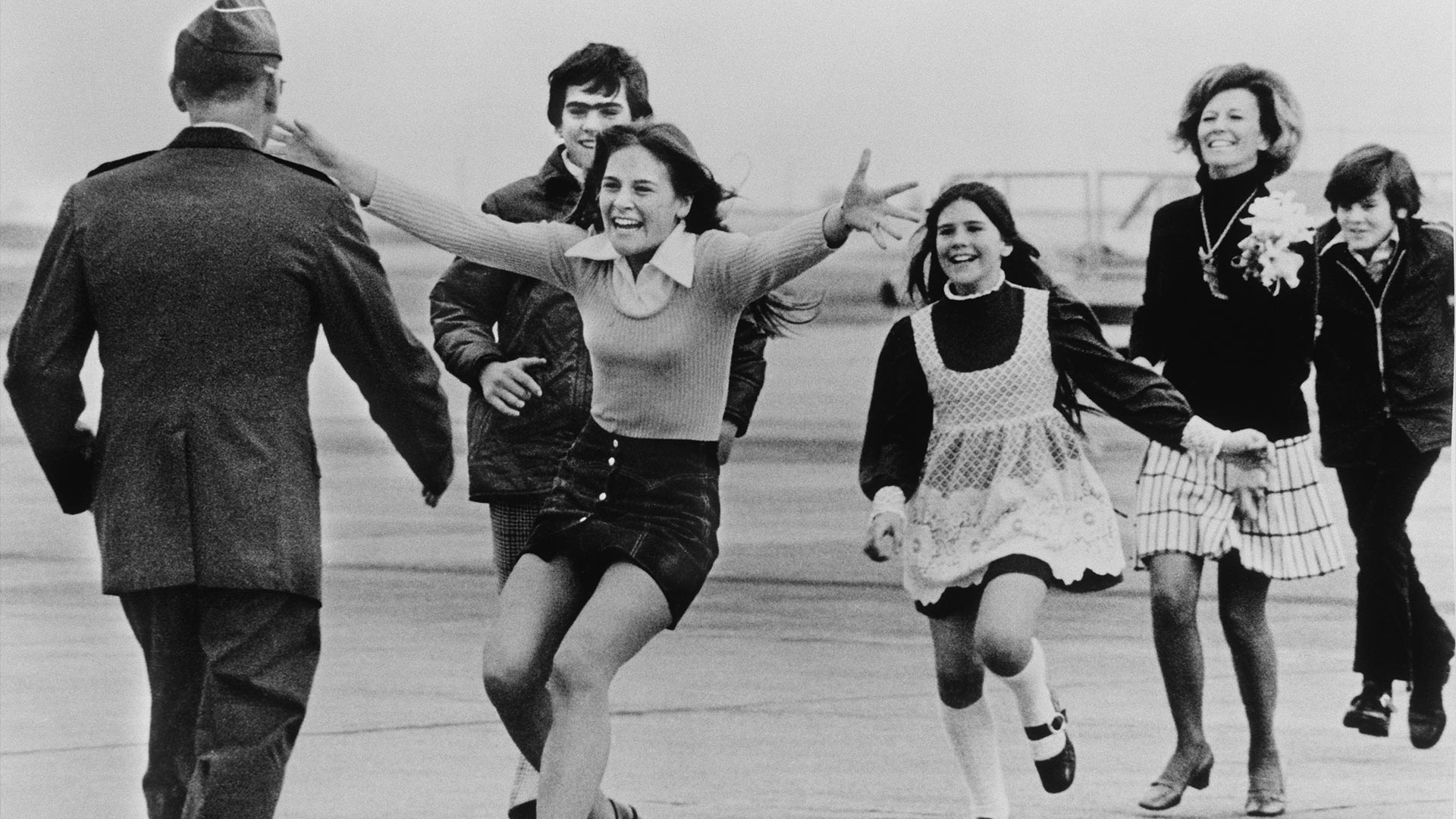 Released POW, Lt. Col. Robert L. Stirm, is greeted by his family. Travis Air Force Base, March 17, 1973.