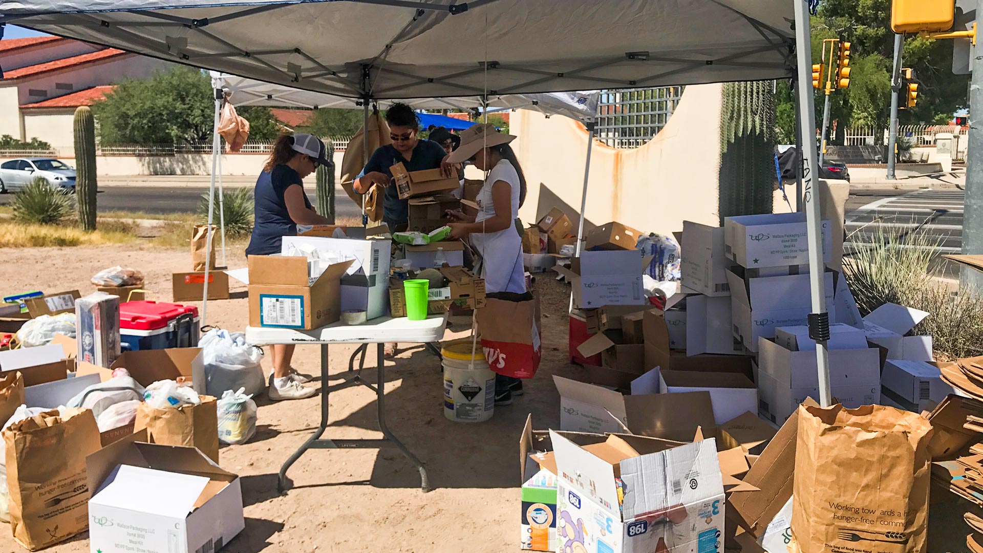 Neighbors in Barrio Hollywood at Speedway and Grande collect semi-truck full of supplies to send to Mexico earthquake survivors.