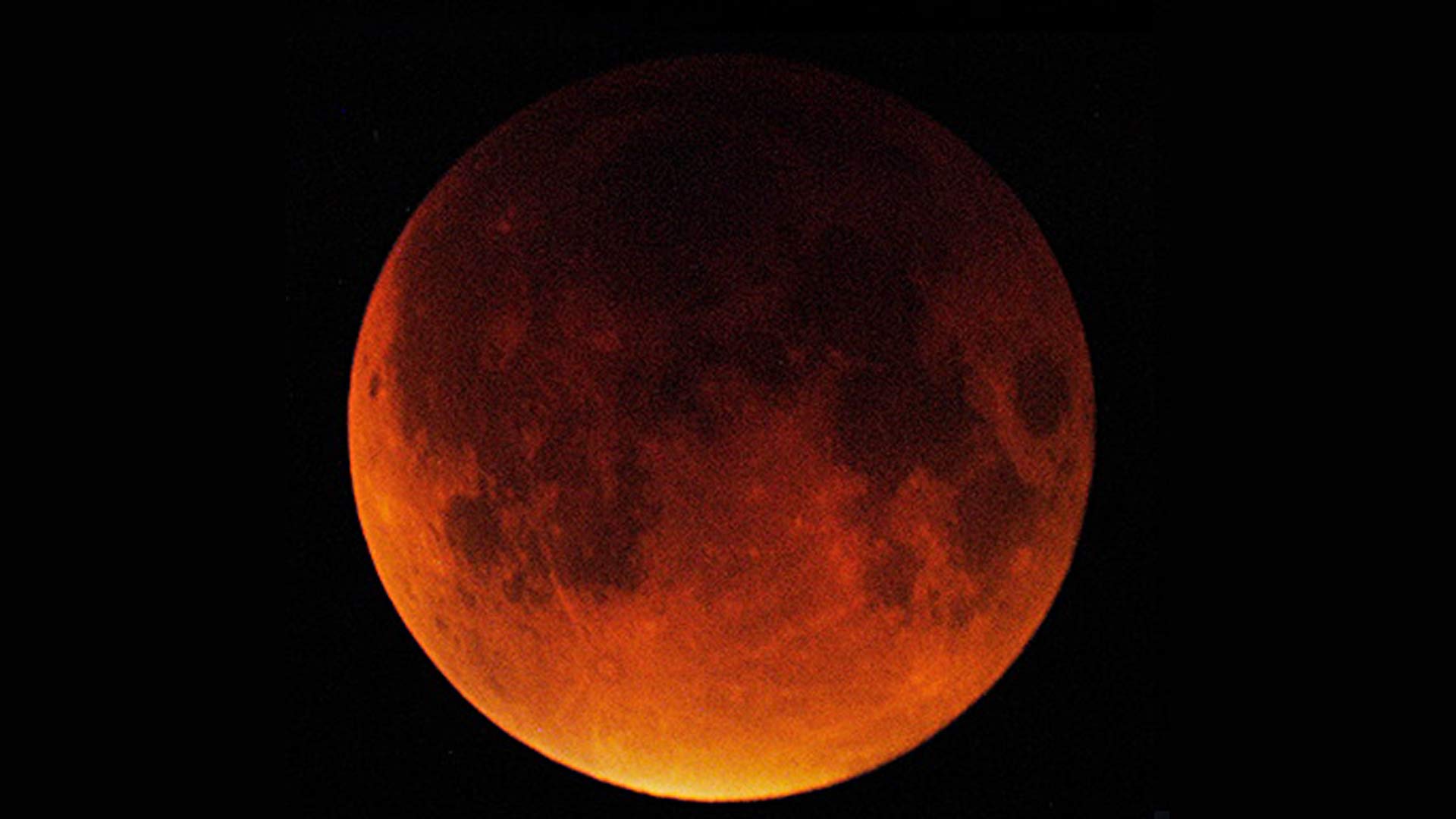 The full moon in total eclipse, Sept. 27, 2015. Photographed in Tucson, Arizona, by Steward Observatory astronomer Glenn Schneider.