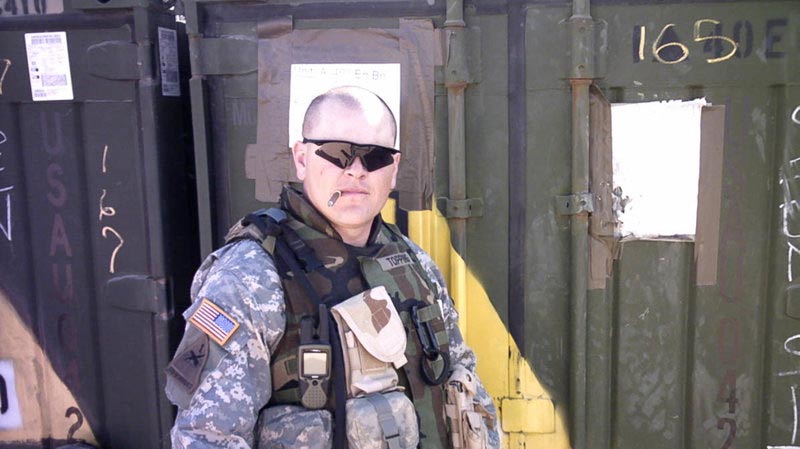 Duane Topping, during his second deployment, as an Army Specialist in Kuwait in 2006.