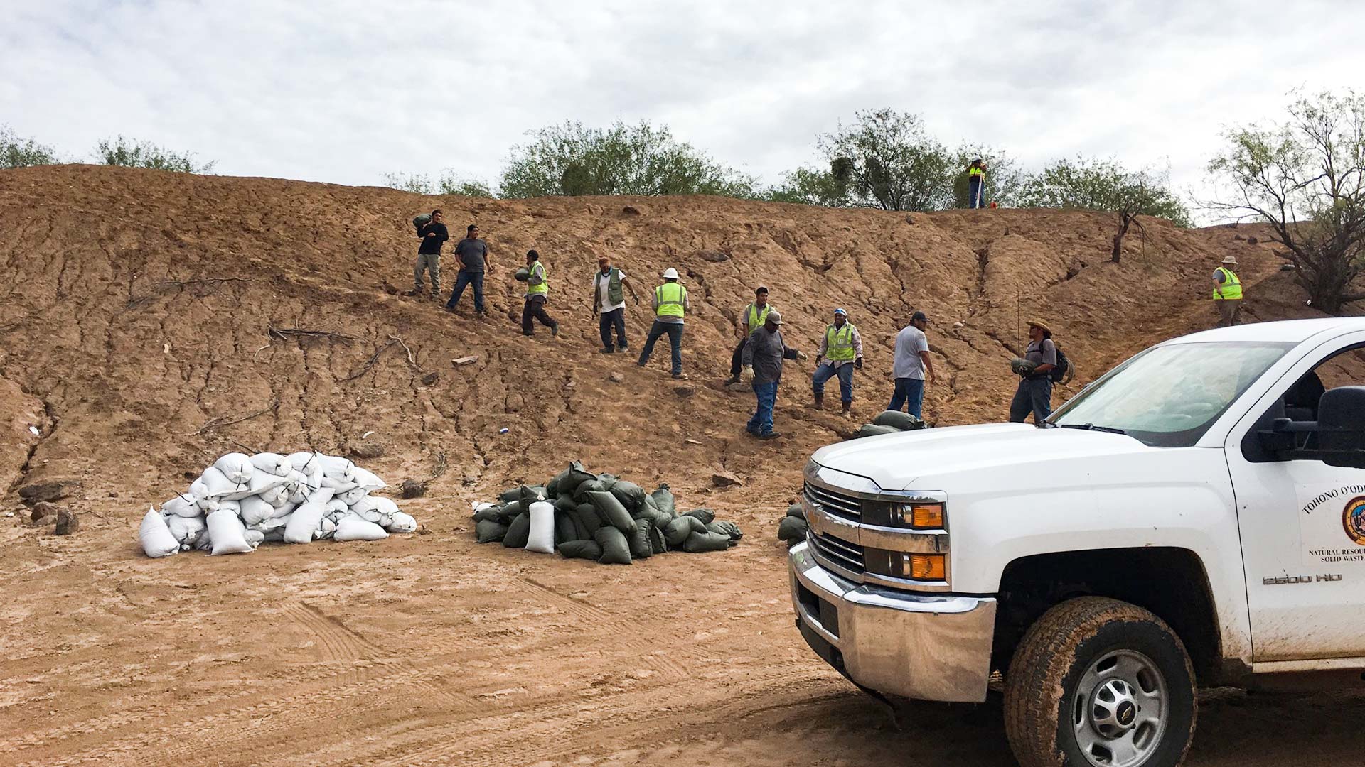 More than 80 volunteers helped fill and place sandbags at Menagers Dam.