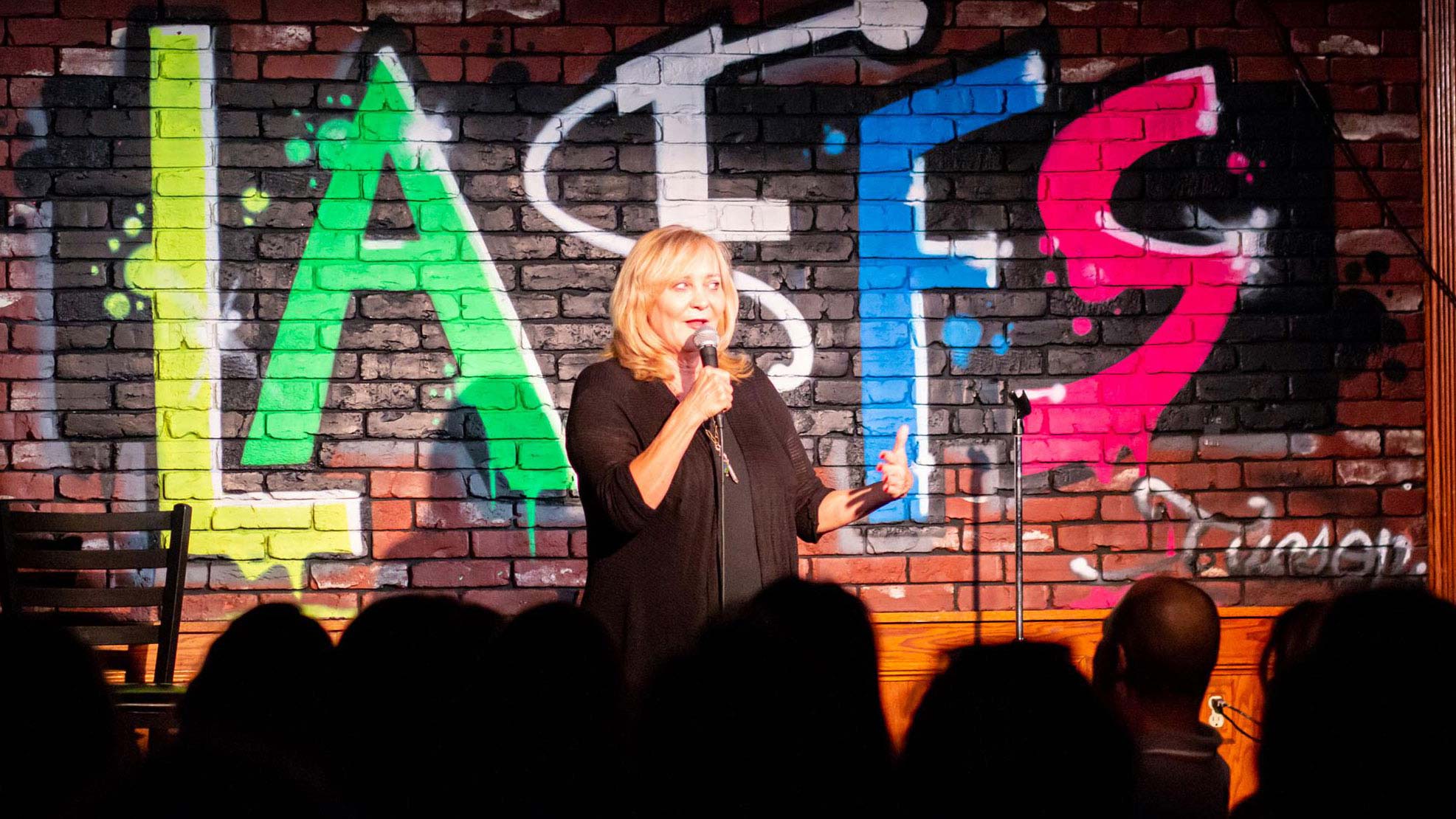 Nancy Stanley and other comedians perform during "The Estrogen Hour" at Laffs Comedy Caffé in Tucson. 