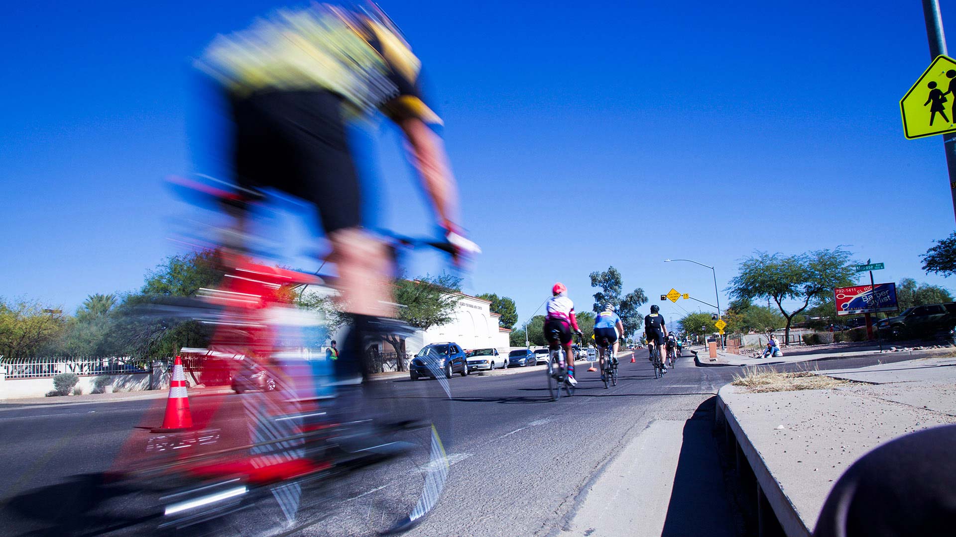 Cyclists ride east on Speedway Boulevard for El Tour de Tucson in 2017.