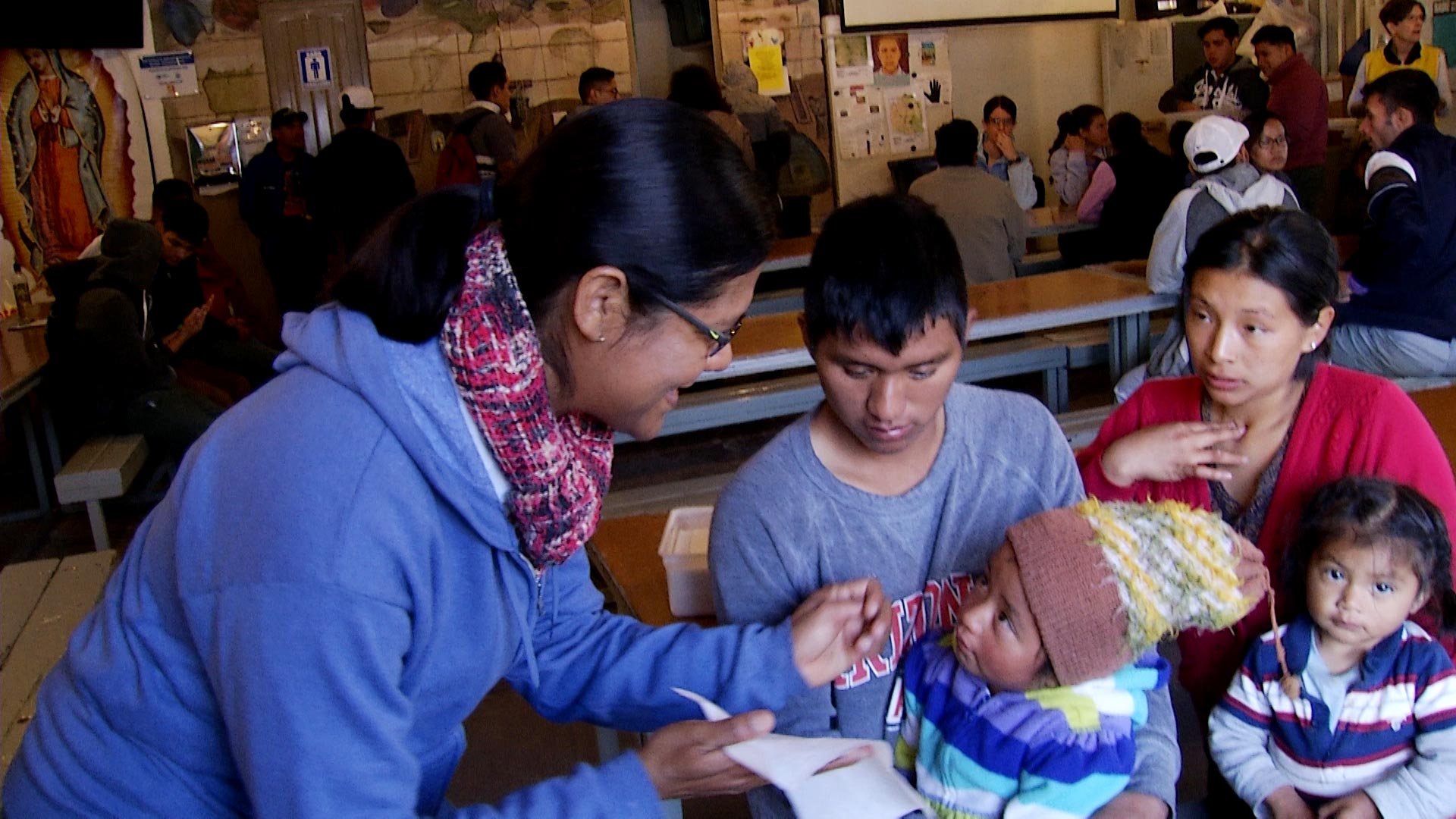 A toddler receives care at a dining hall run by Kino Border Initiative in Nogales, Sonora on November 20, 2018. Kino Border Initiative serves free meals to migrants, asylum seekers and deportees. 