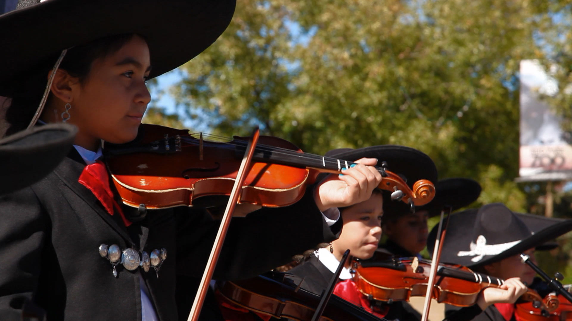 A youth mariachi group perform at StoryCorp outside the Reid Park Zoo on November 19, 2015.
