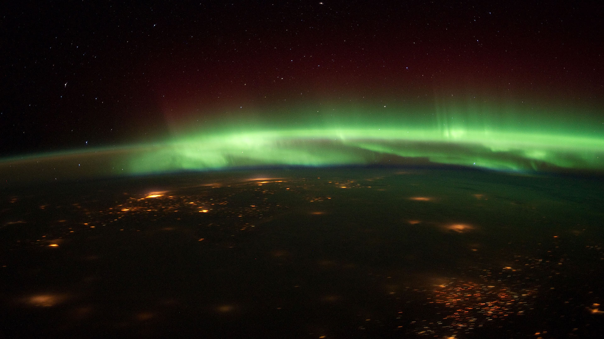 The Aurora Borealis dances over the U.S. Midwest Jan. 25, 2012, from the vantage point of the International Space Station.