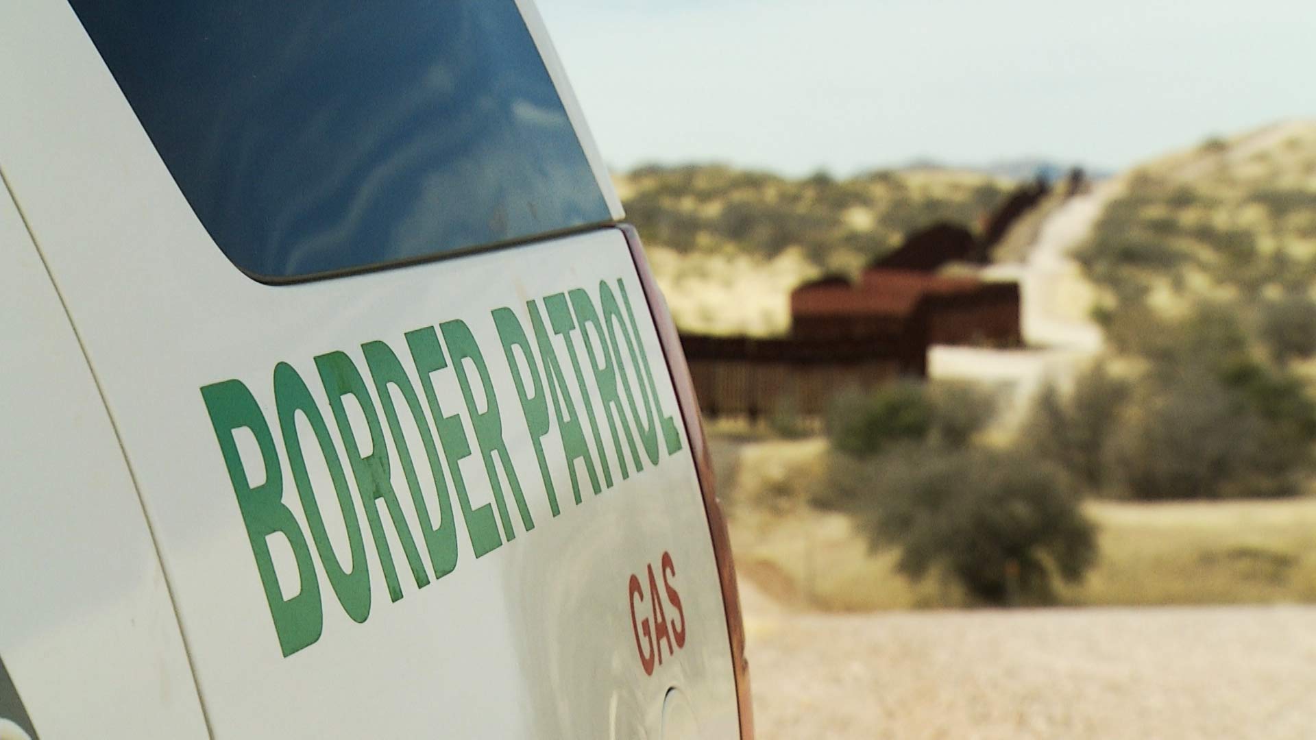 A Border Patrol vehicle at the fence on the U.S.-Mexico border near Nogales.