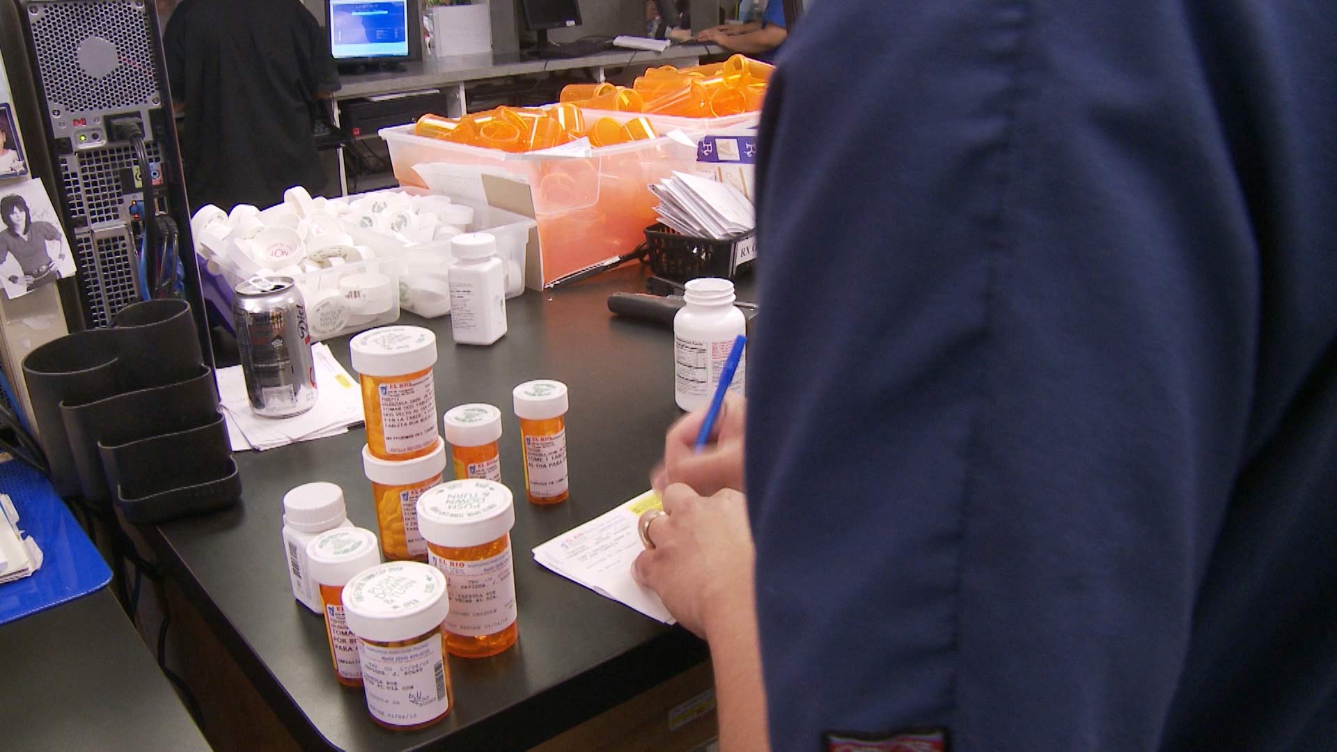 Filling prescriptions at a pharmacy.