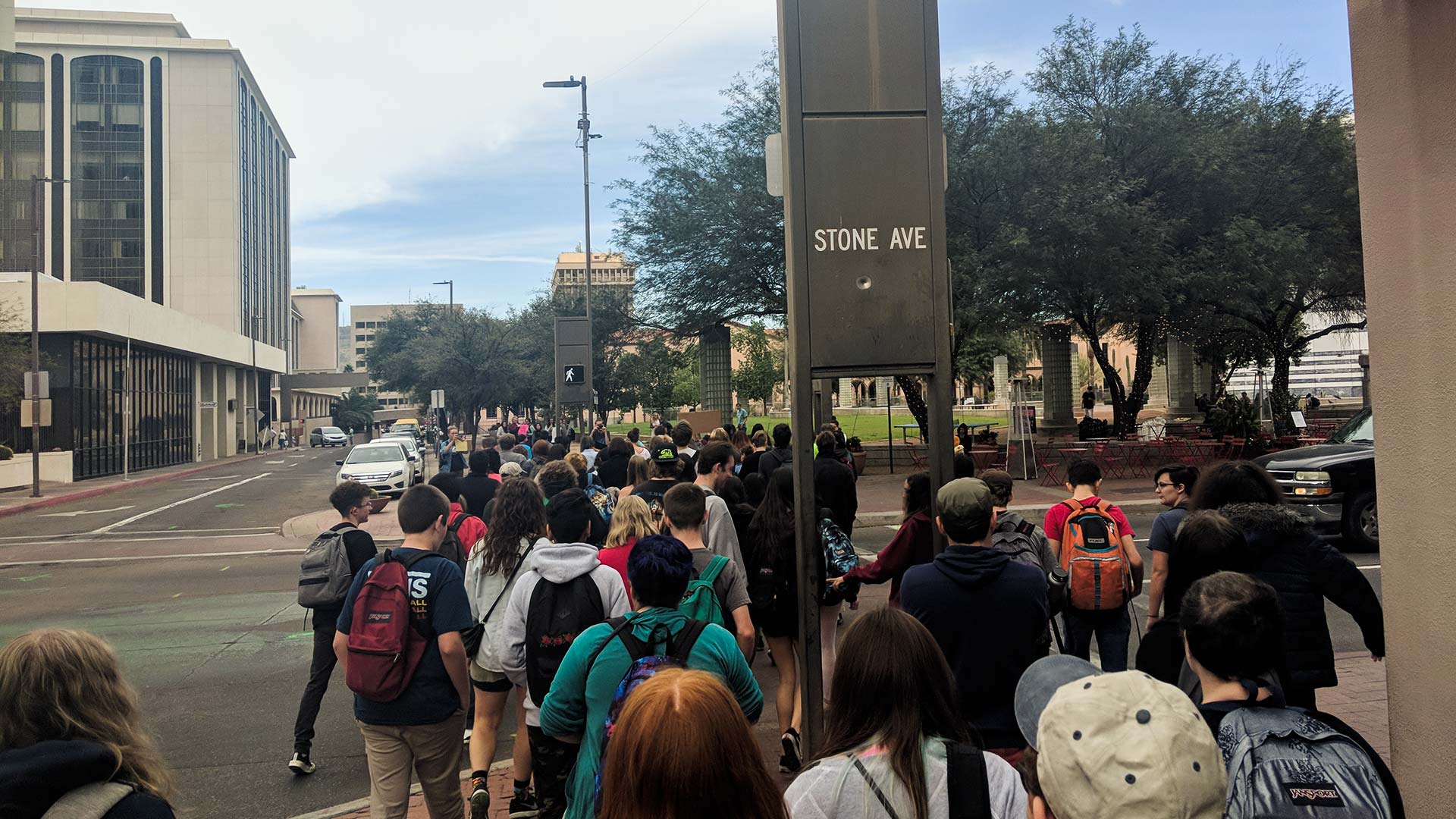 City High School students walk out of school as part of a national event protesting gun violence on March 14, one month after a school shooting in Florida killed 17.