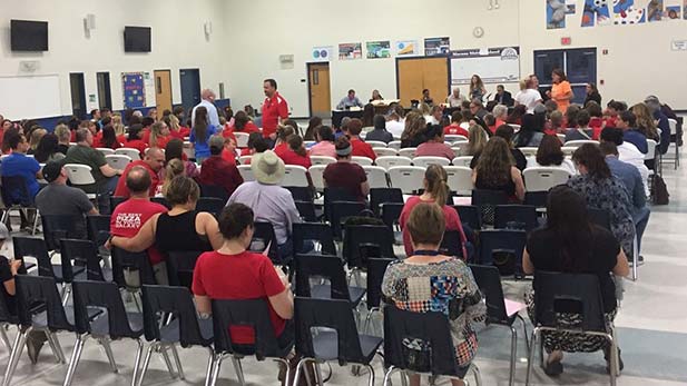 The Marana Unified School District hosts its board meeting in the Marana Middle School cafeteria to vote on closing Thornydale Elementary. 