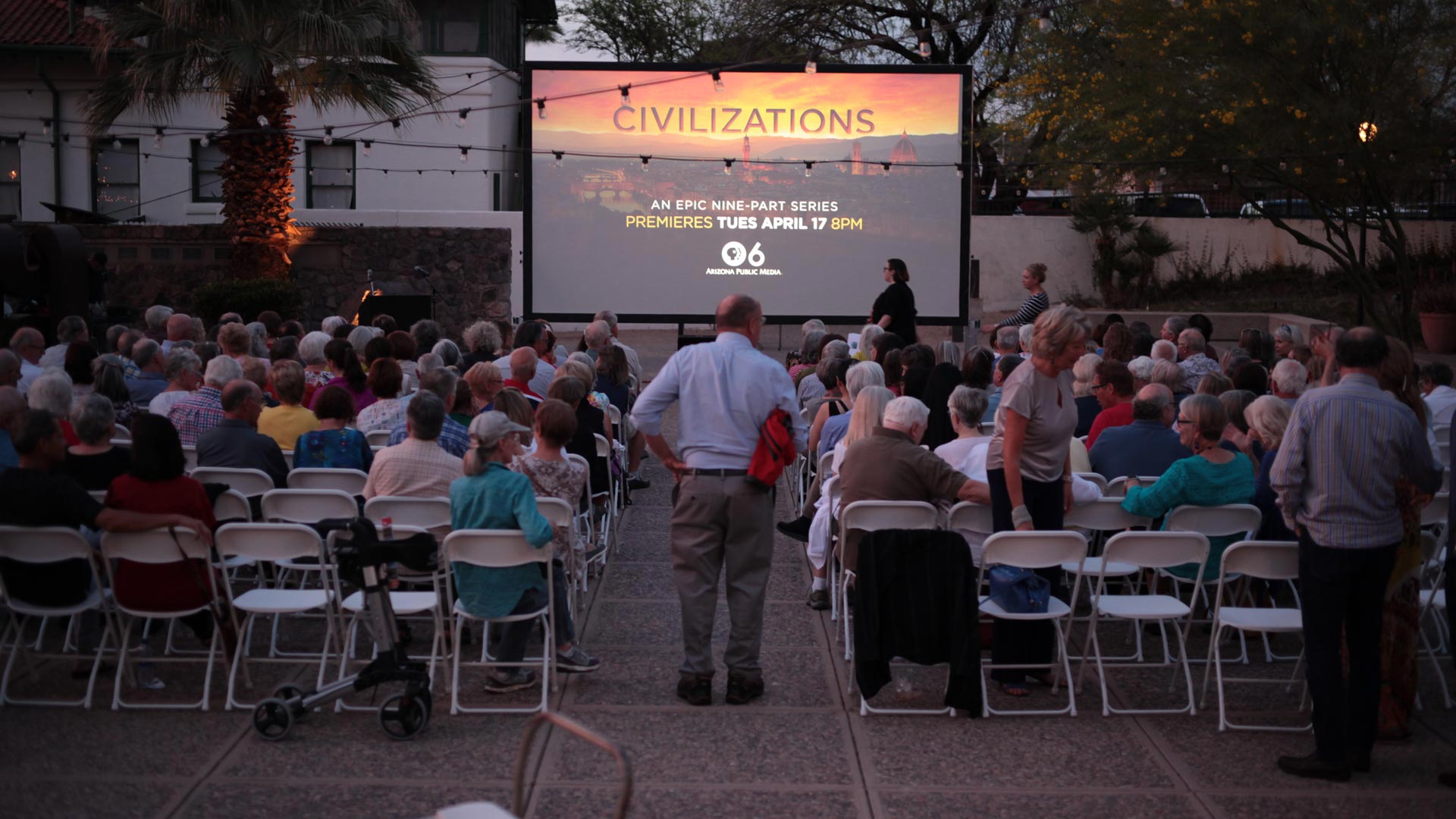 Attendees sit down to watch our outdoor preview screening of "Civilizations."