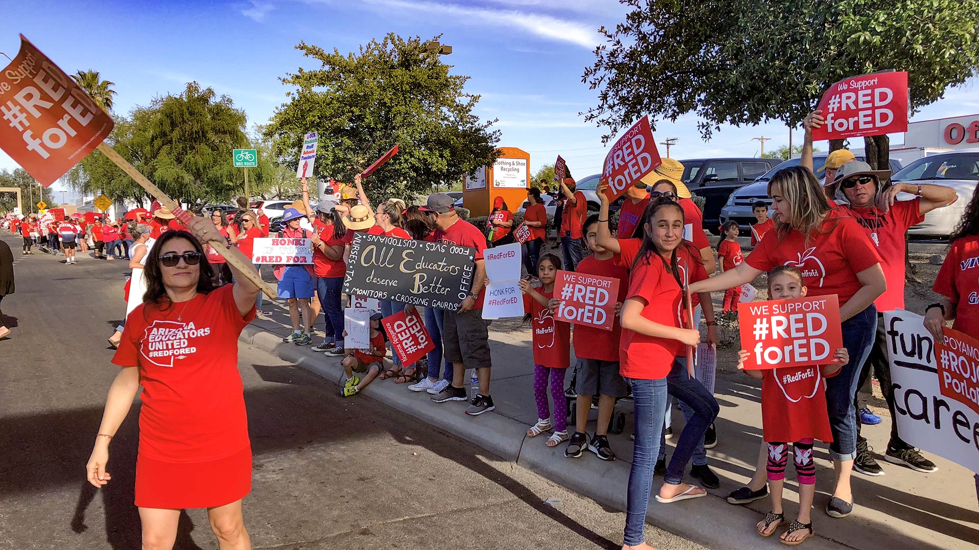 Demonstrators gather on Broadway in Tucson April 25, 2018 to protest for more state education funding, one day before a walkout that closed schools all over the state.