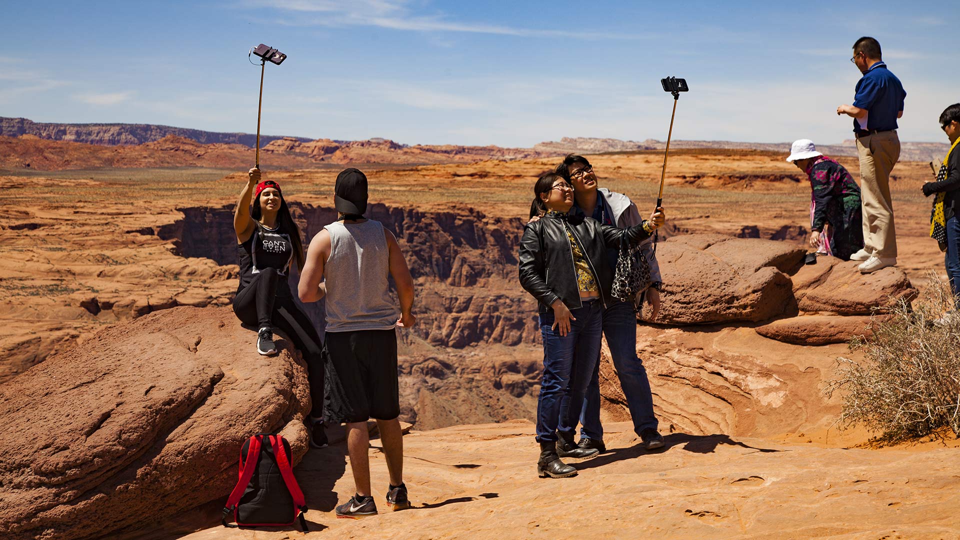 Tourists snap selfies at the iconic Horseshoe Bend, near Page, Arizona, April 2018.