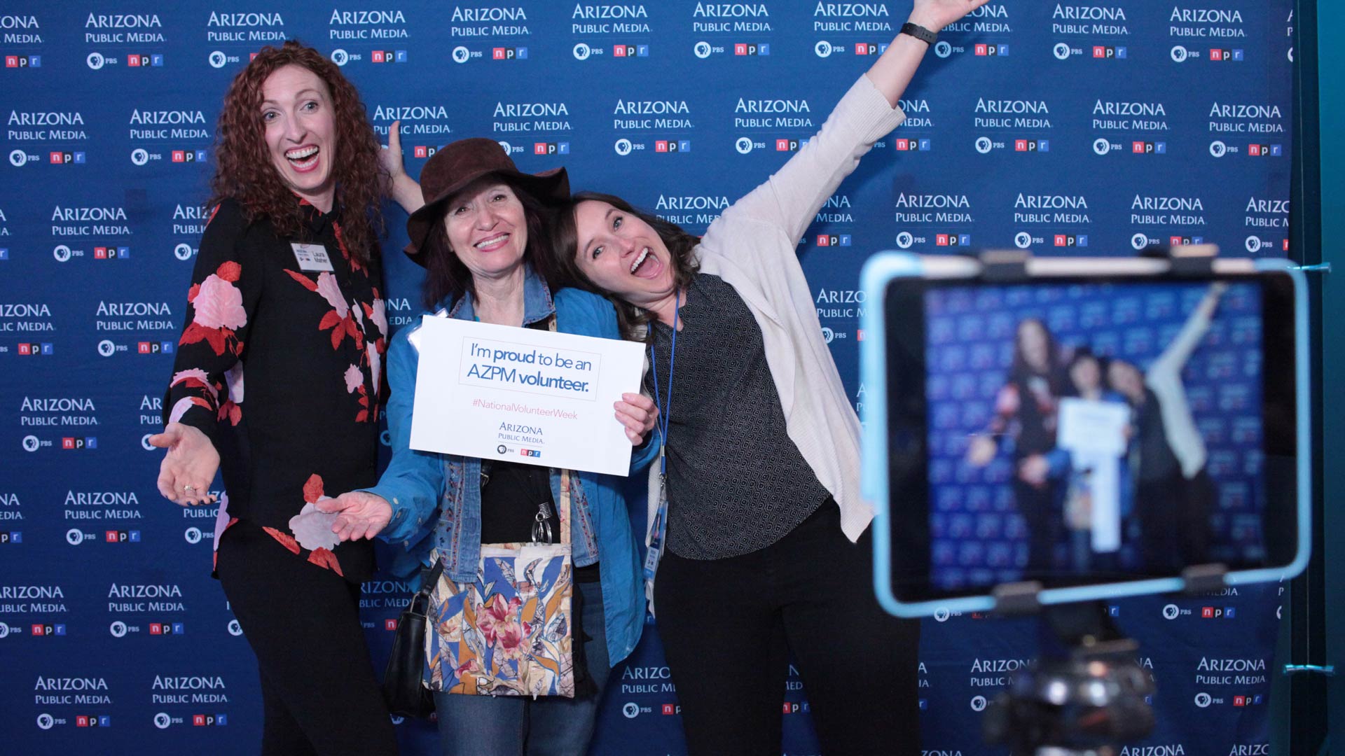 Volunteers and staff had fun at the AZPM photo booth during the reception on April 19.