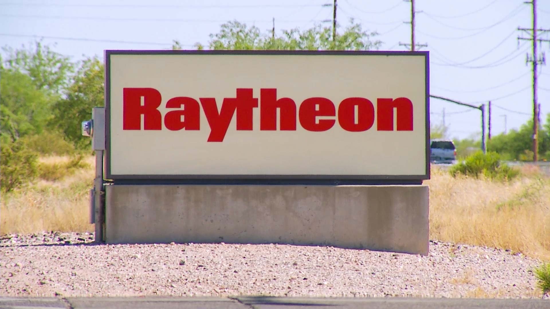 raytheon sign hero