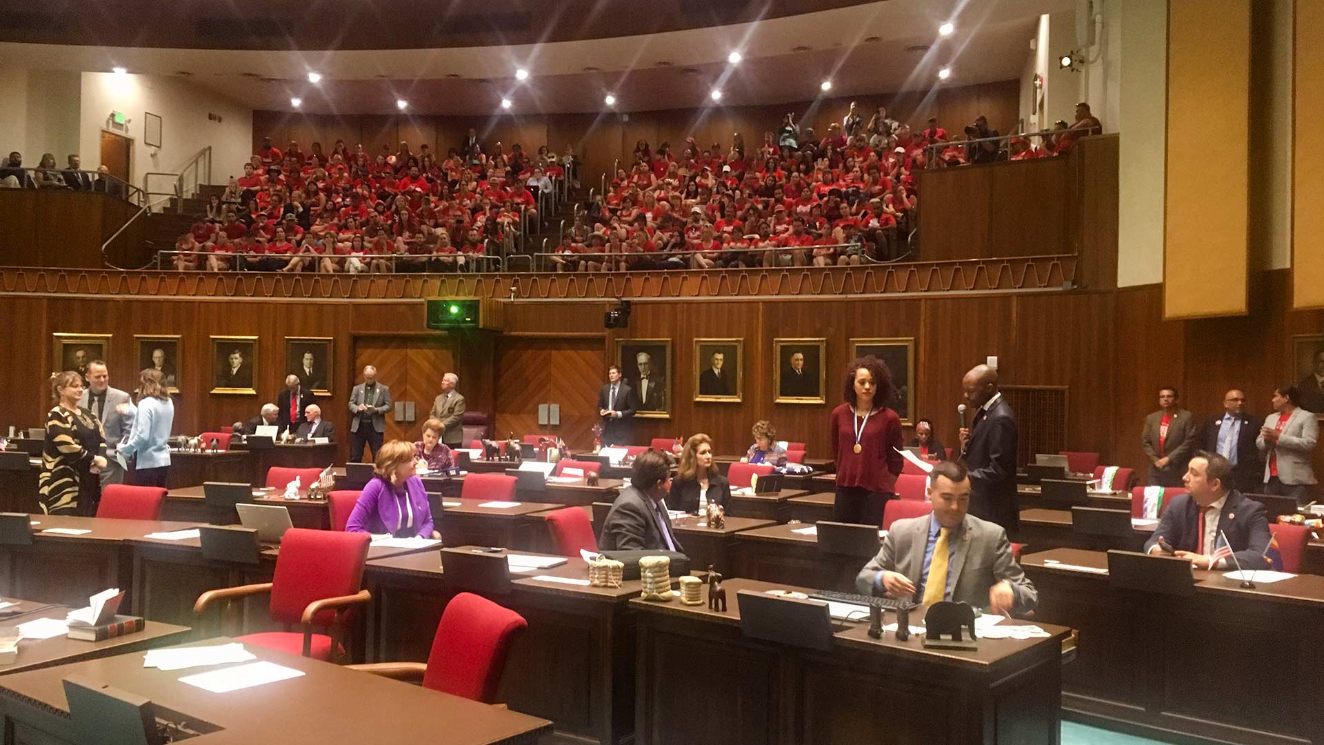 Teachers wearing #RedForEd fill the Arizona House gallery, April 20, 2018.