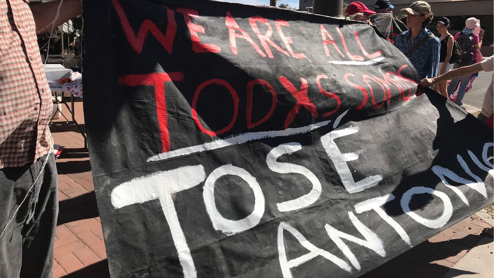 Protesters gather outside the U.S. District Courthouse in Tucson after federal prosecutors announce they will seek a second trial of manslaughter charges against U.S. Border Patrol Agent Lonnie Swartz. Swartz was acquitted on second-degree murder charges in the death of Jose Antonio Elena Rodriguez, a Mexican citizen.