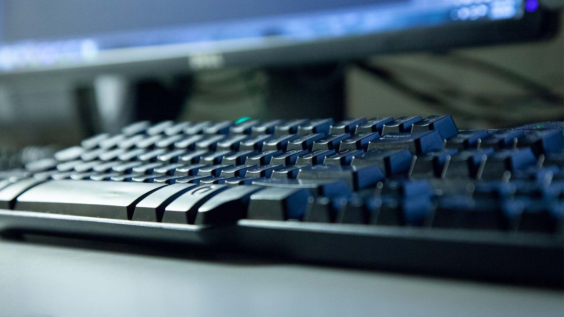 A keyboard on a desk.