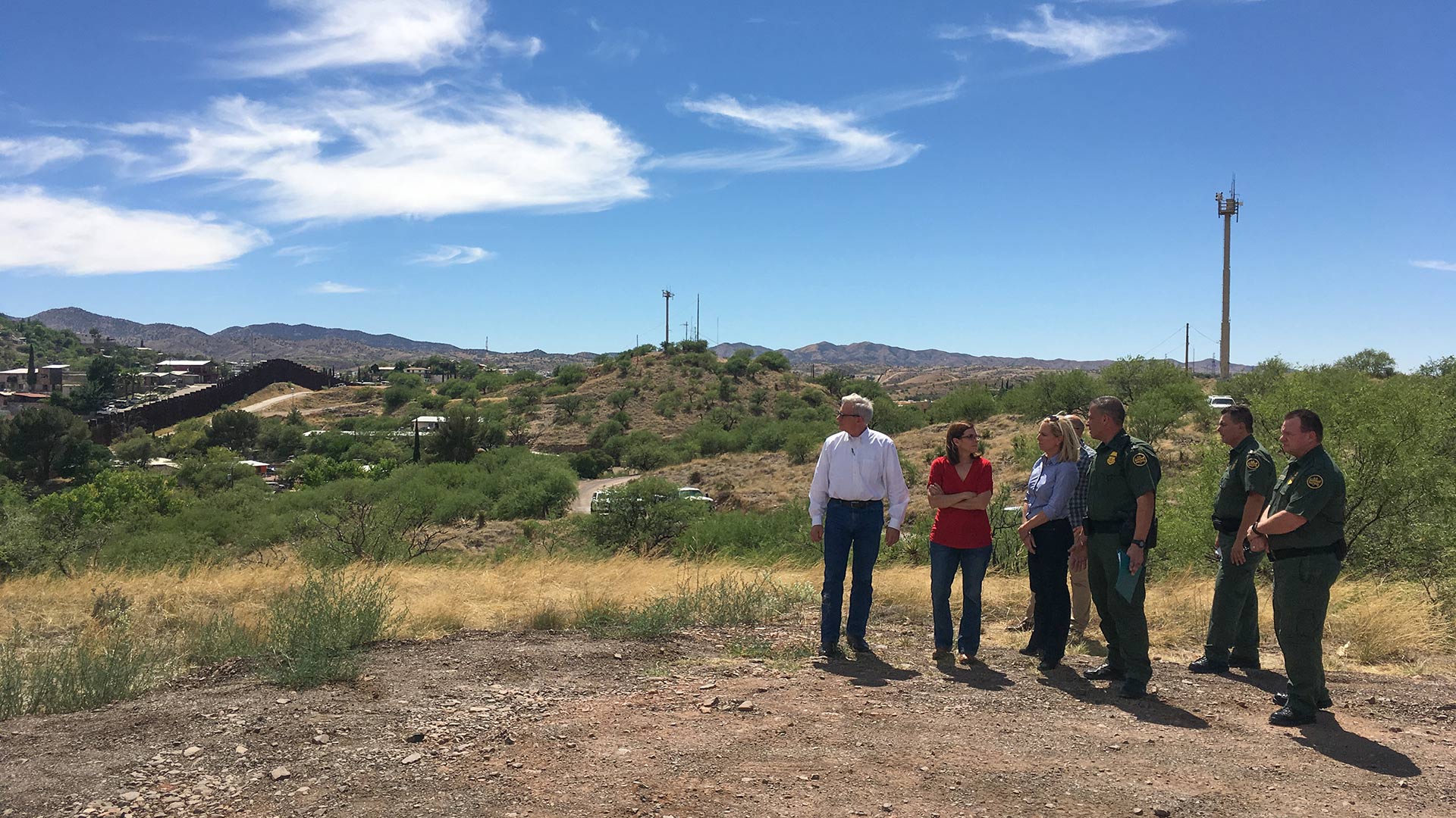 U.S. Reps. David Schweikert and Martha McSally and Homeland Security Secretary Kirstjen Nielsen are joined by  Border Patrol agents at the border fence in Nogales.