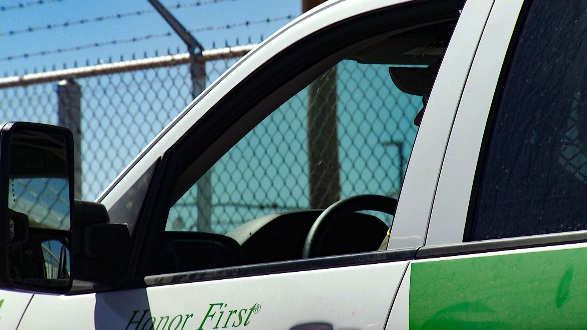 A Border Patrol agent sits in his vehicle, June 2018.