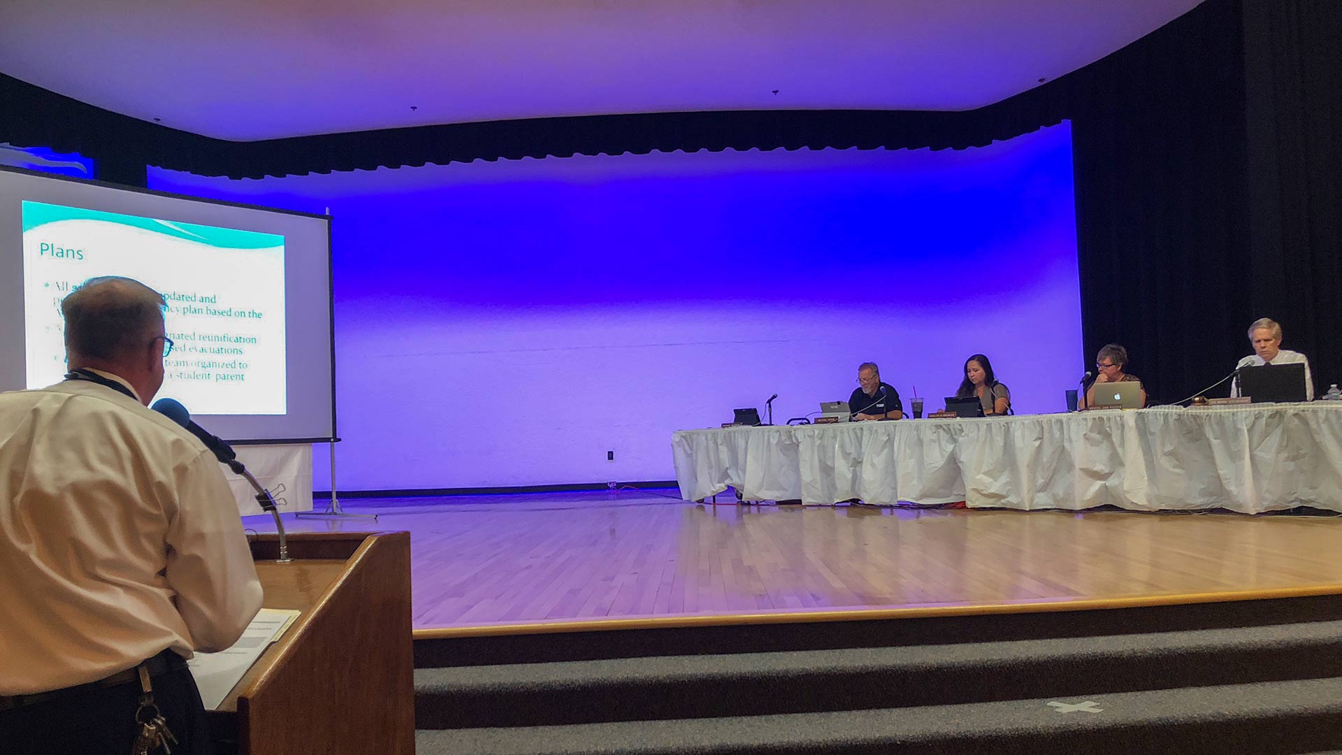 Tucson Unified School District holds town hall meeting on June 5, 2018. During the meeting, School Safety Director Jeffrey Coleman, left, presents an emergency-preparedness presentation. 