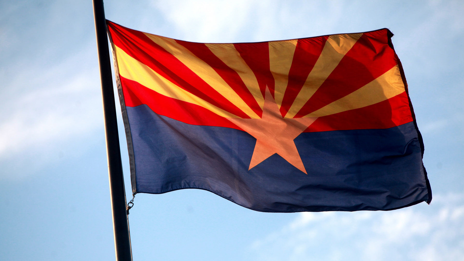 The Arizona flag outside the Arizona Capitol Museum in Phoenix, Arizona.