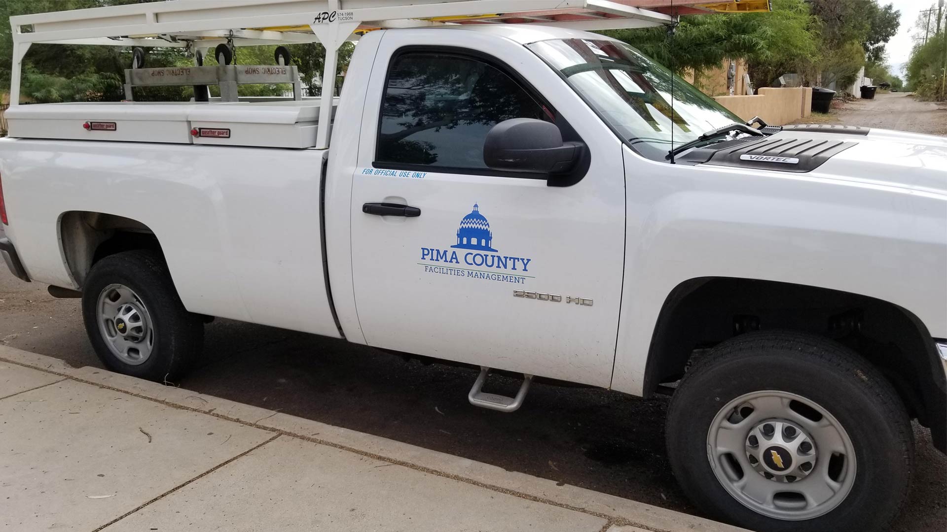 A Pima County Facilities Management truck parked outside Himmel Park, July 2018.