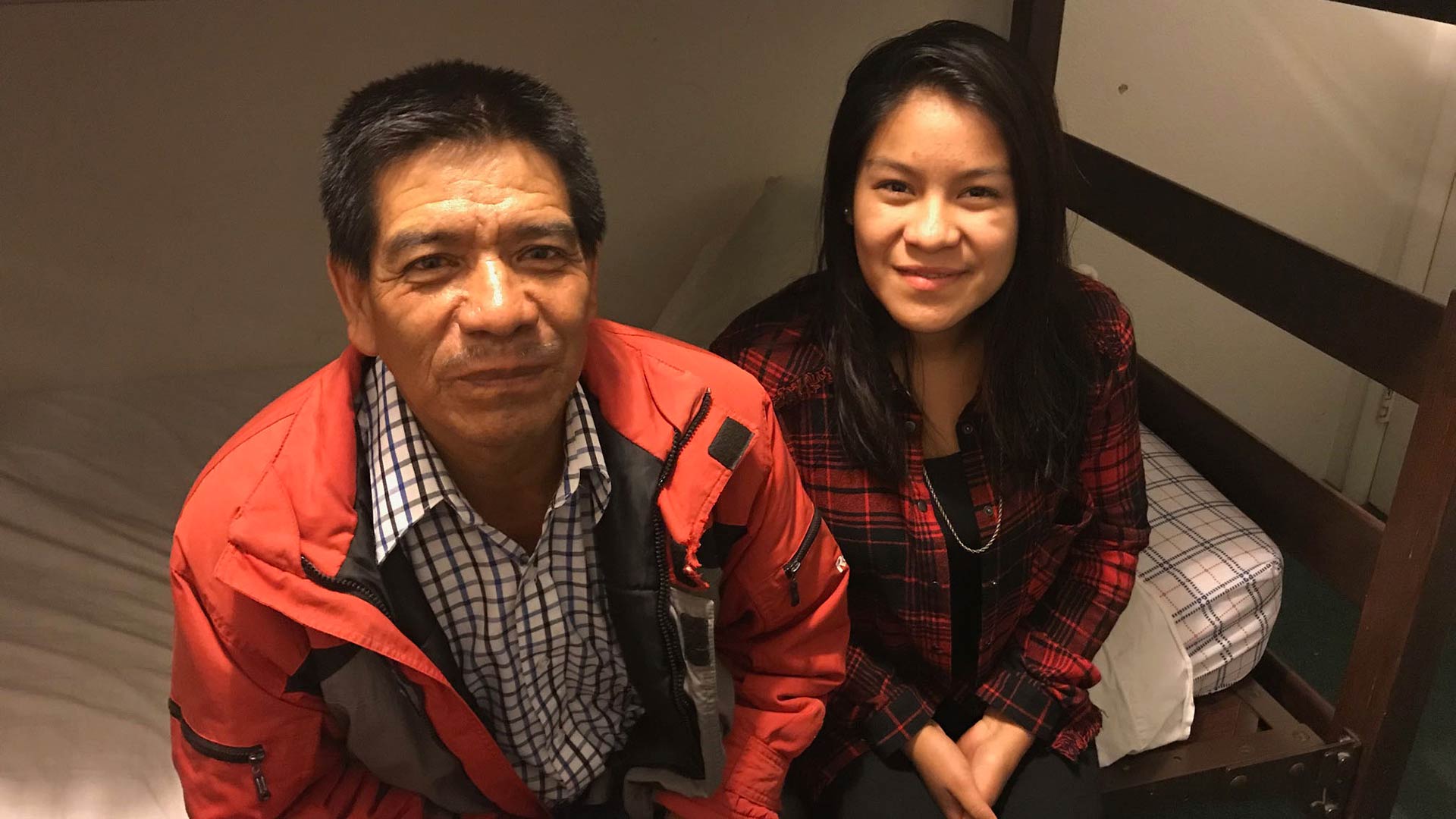 Guillermo Tomas and his daughter Jesse Tomas wait at Tucson's Casa Alitas for their travel to Florida to be arranged. 