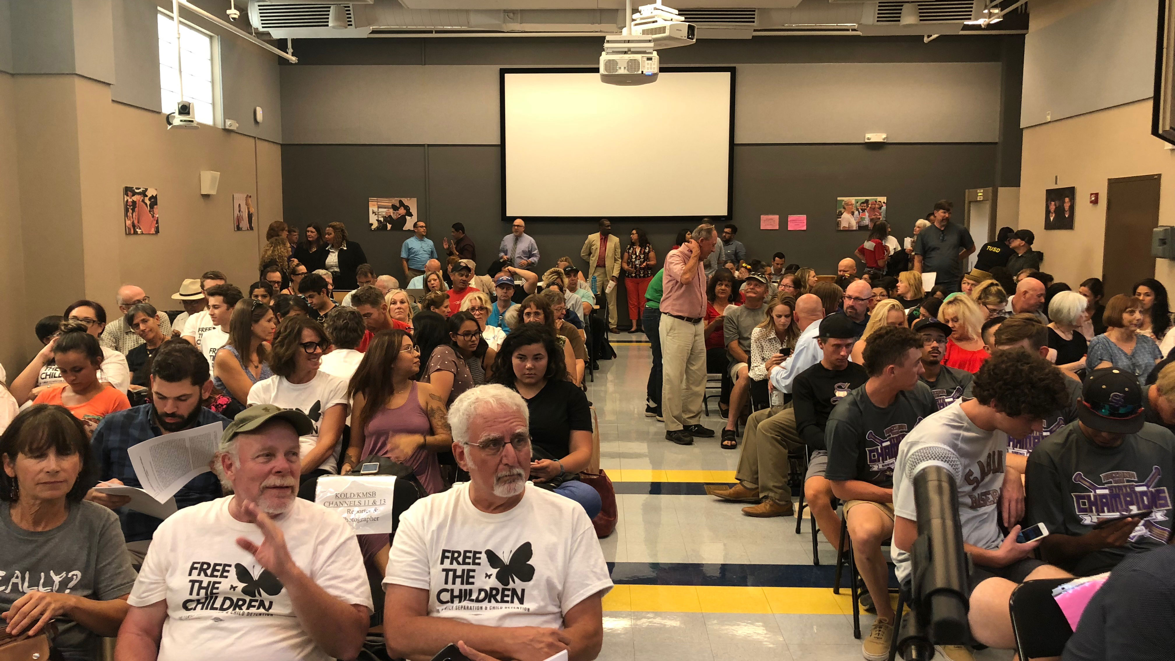 Parents, educators and community members pack the TUSD governing board meeting on July 24, 2018 to hear if the board will continue investigating the role of the district in educating immigrant children held at the Southwest Key facility. 