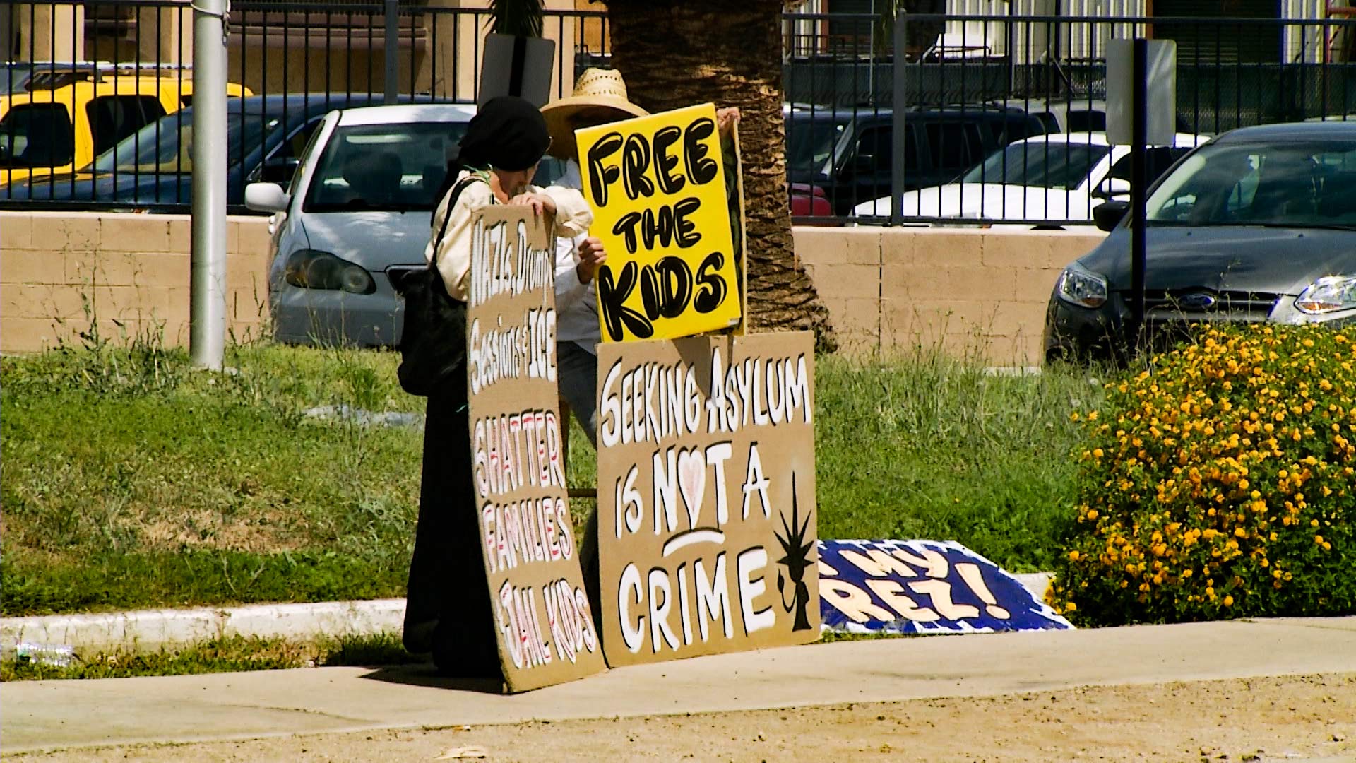 Demonstrators protest the separation if immigrant children from their parents during the visit of First Lady Melania Trump to Tucson, June 28, 2018.