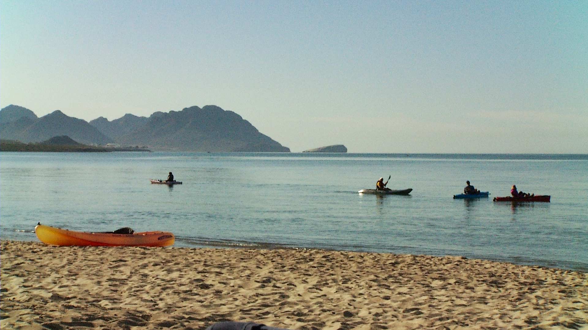 Kayakers at a beach in San Carlos.