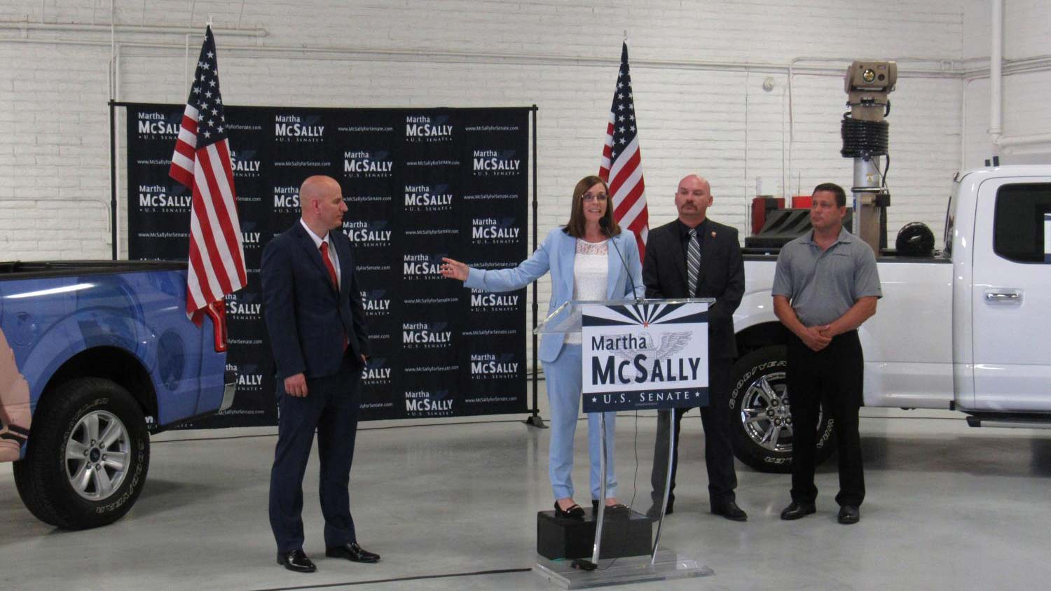 U.S. Congresswoman Martha McSally gestures toward Brandon Judd, president of the National Border Patrol Council, as she accepts the union's support in the race for U.S. Senate. McSally will face other Republicans in the Aug. 28 Arizona primary election.
