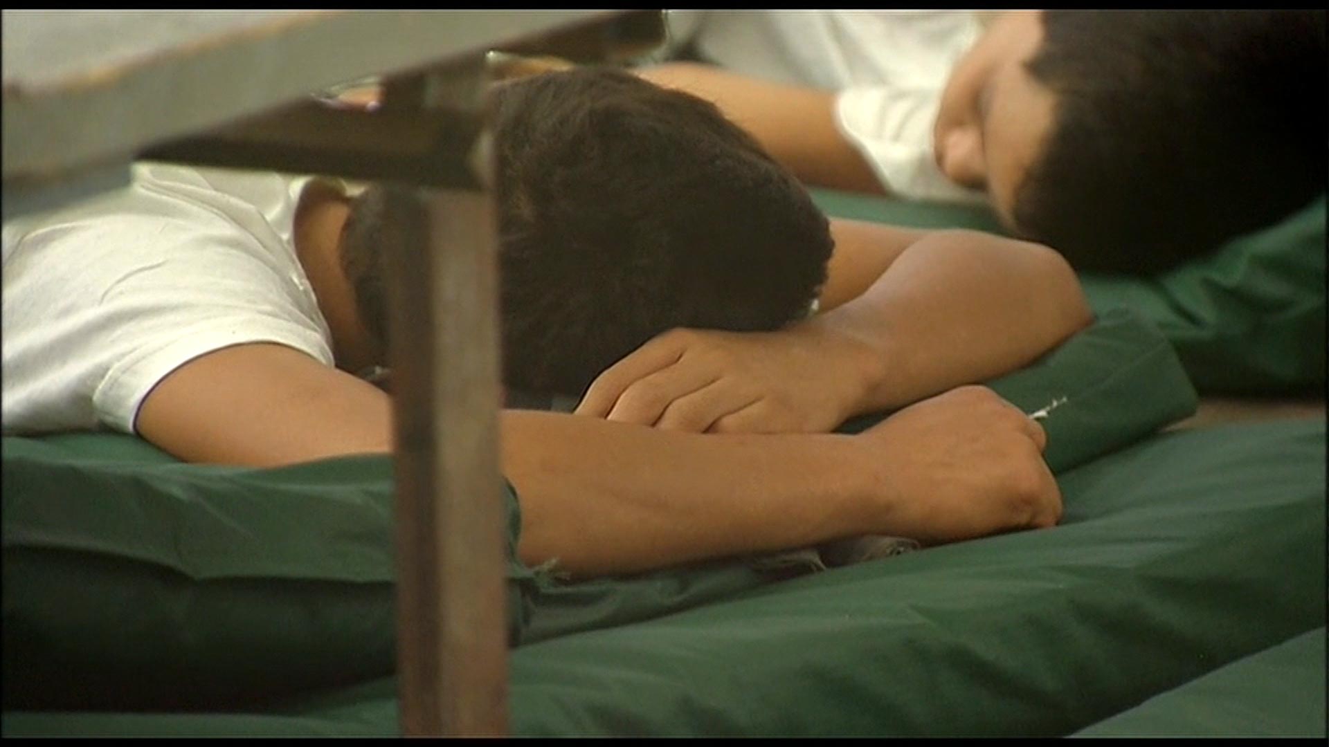 Immigrant children rest at a detention facility in Nogales, Arizona in 2014. 