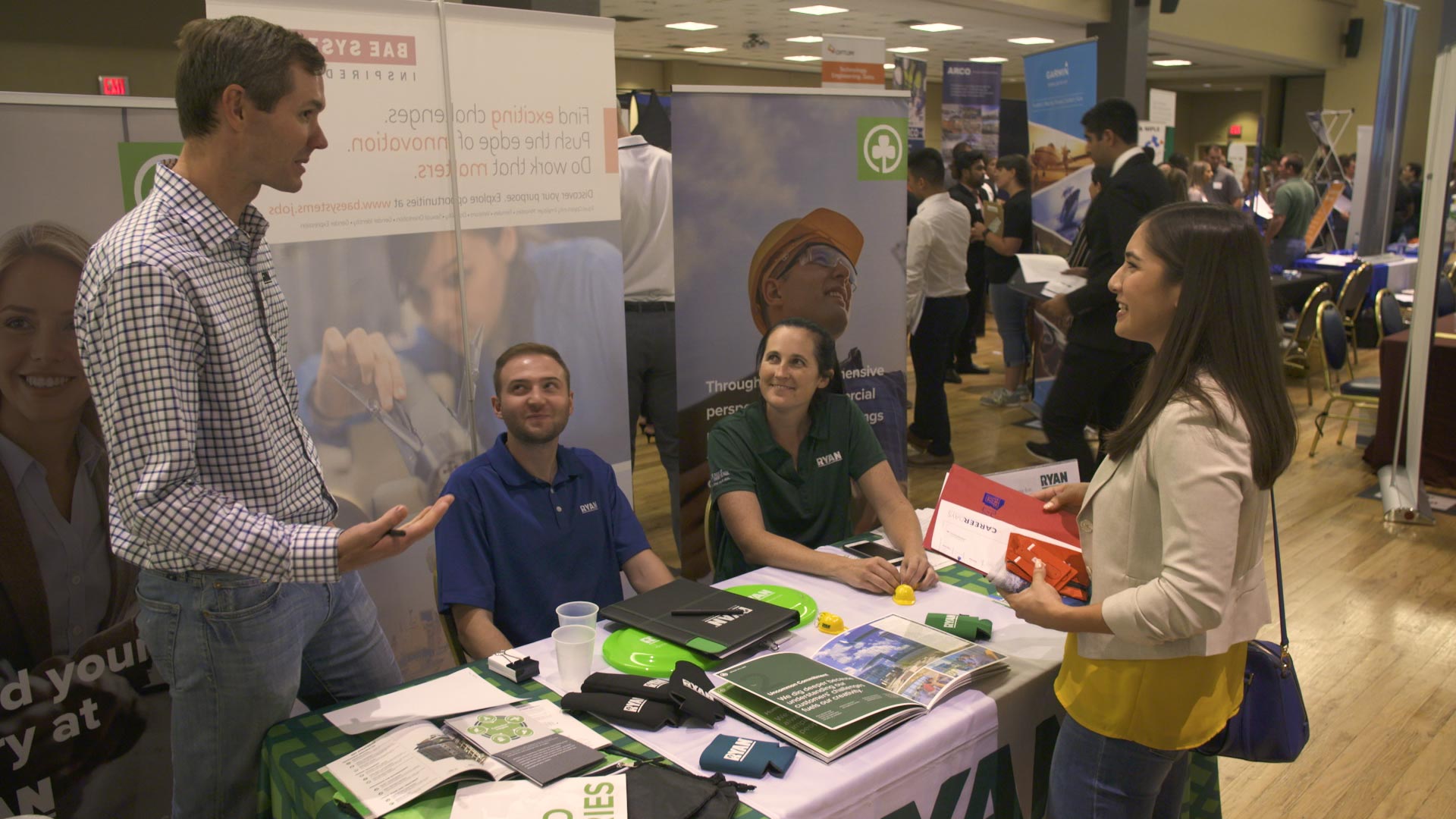 A student interacts with recruiters at a career fair held at the University of Arizona on September 12, 2018. 