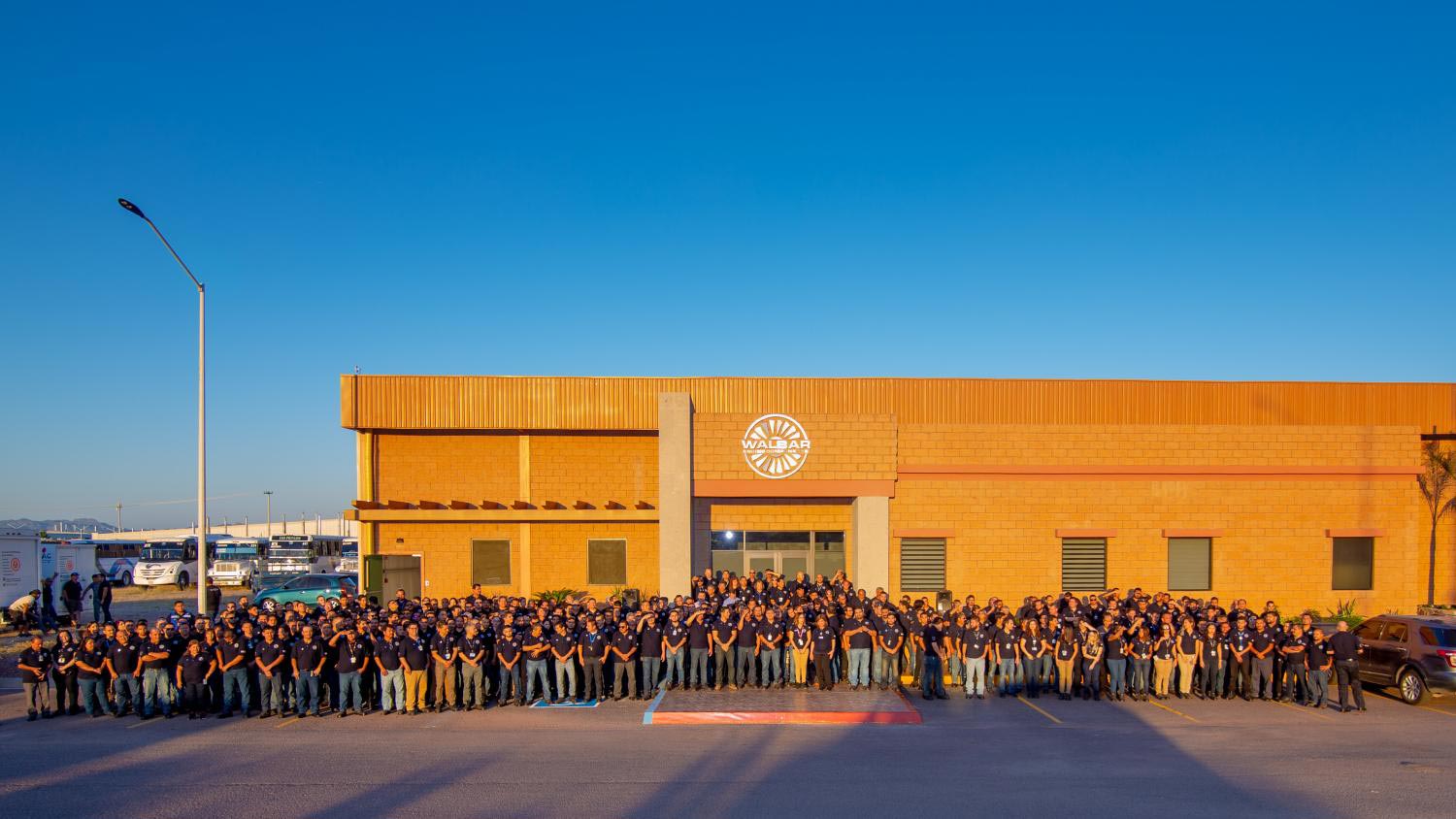 Walbar employees stand in front of the recently completed manufacturing facility in Guaymas, Sonora.
