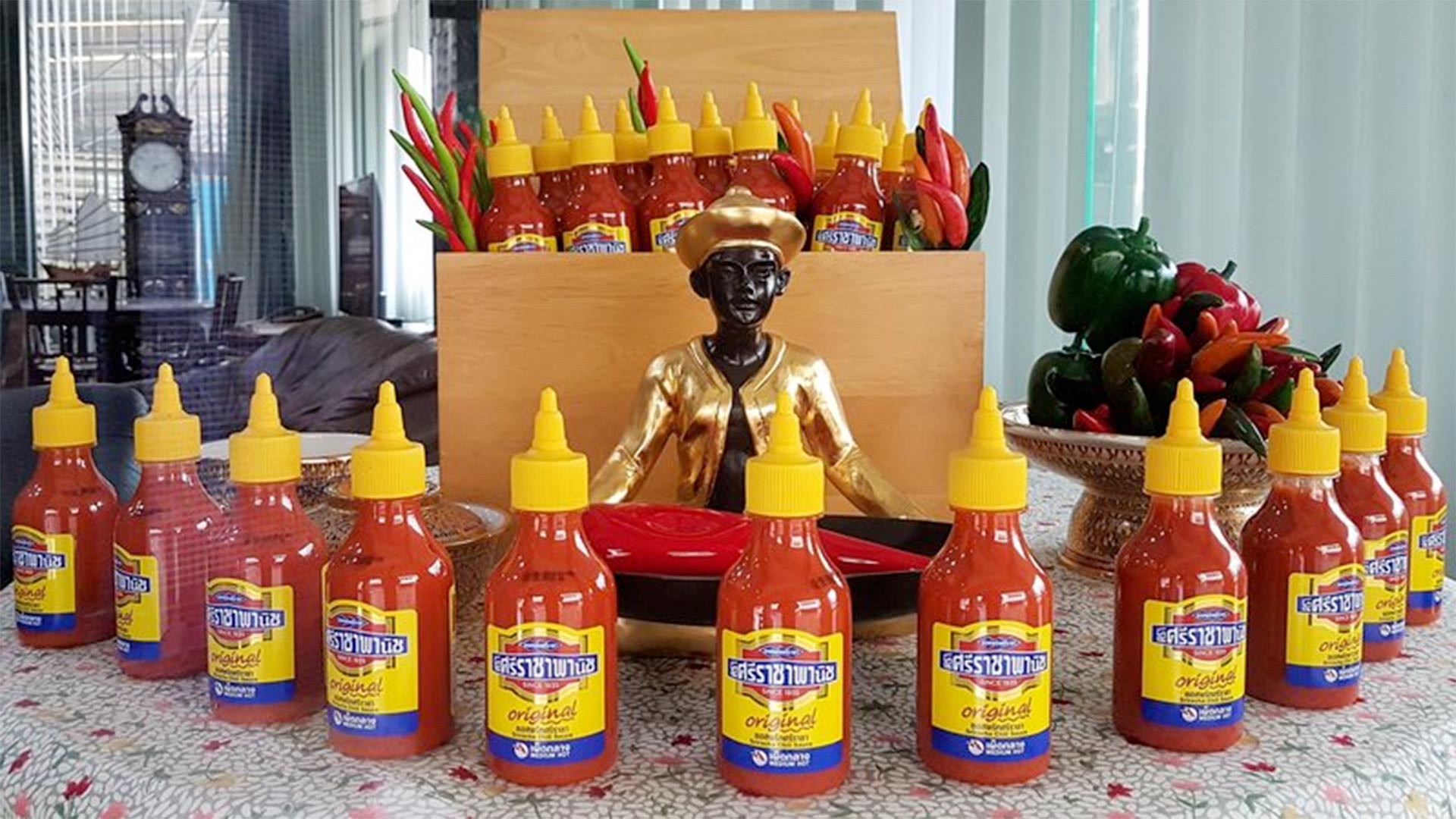 Sriraja Panich is the brand name of one of two Sriracha sauces created by Saowanit Trikityanukul's family. The family sold the brand to Thaitheparos, Thailand's leading sauce company, in the 1980s. The brand has struggled to gain a foothold in the U.S., where the Huy Fong Rooster brand of Sriracha, created by Vietnamese-American David Tran, reigns supreme.