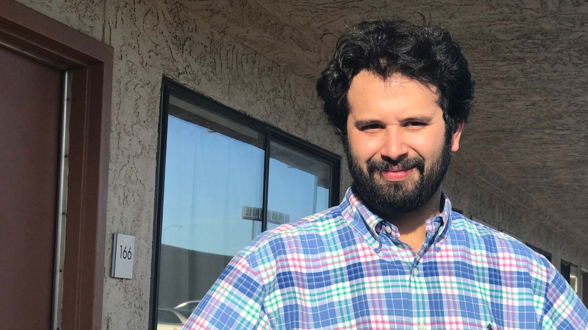 Diego Pena-Lopez, with Casa Alitas, helping to set up a makeshift Tucson migrant shelter in December 2018.