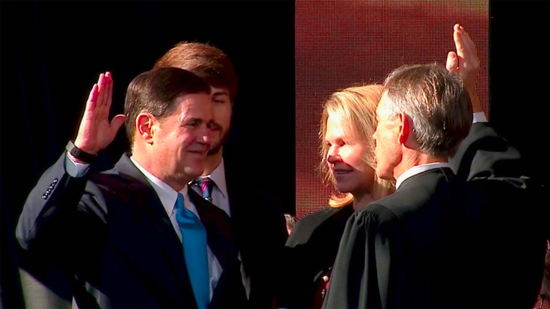 Gov. Doug Ducey is sworn in for his second term, Jan. 7, 2019, in this still image of a live stream of the event.