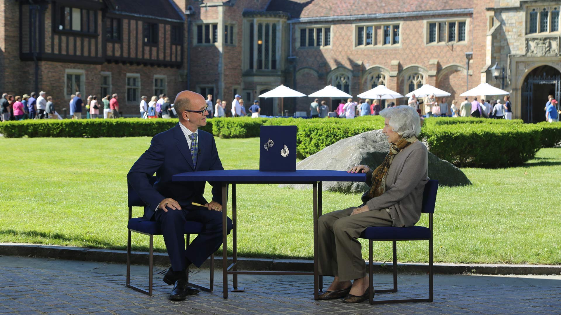 Peter J. Shemonsky (left) appraises 1939 Harry Bertoia silver brooches at Meadow Brook Hall in Rochester, MI.