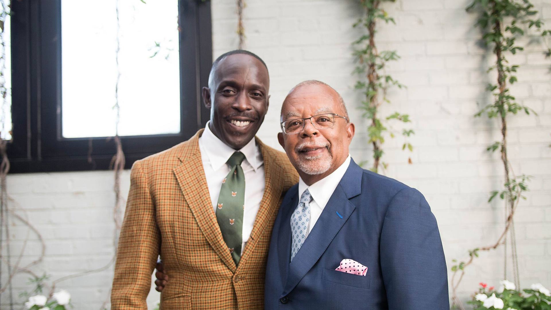 Host Henry Louis Gates, Jr. with actor Michael K. Williams while taping Finding Your Roots.
