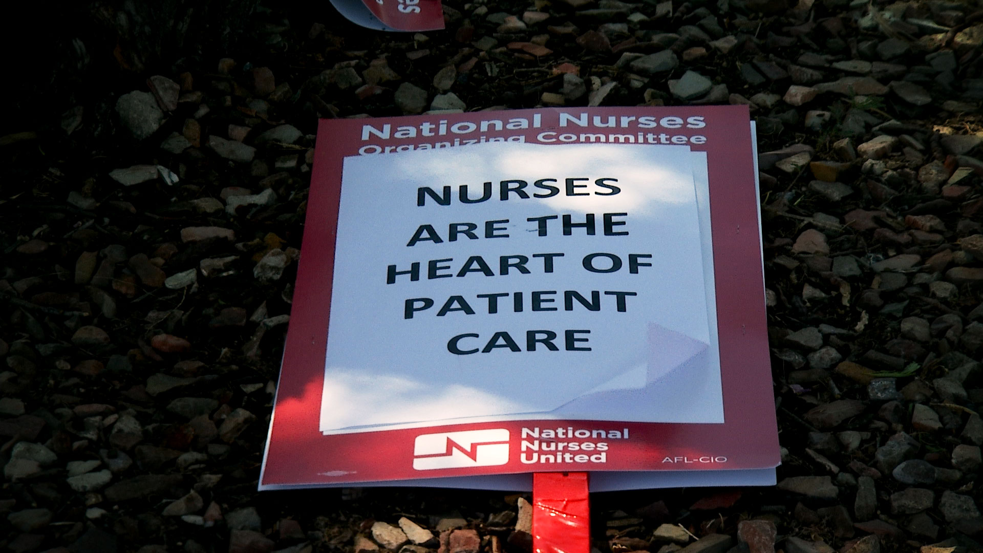 A sign used by nurses participating in a one-day strike outside St. Mary's Hospital on September 20, 2019. 