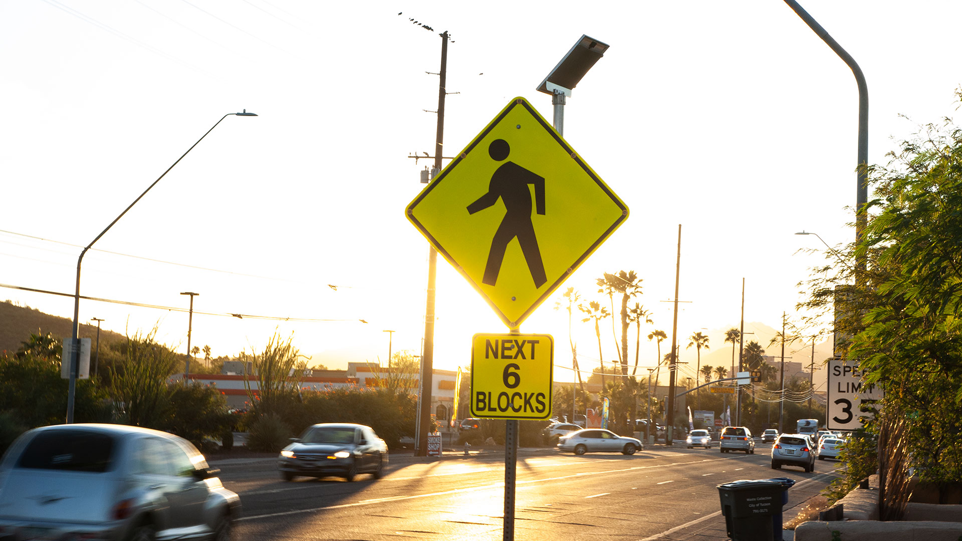 A sign warning drivers of high pedestrian traffic on West St. Mary's Road in Tucson on a late October afternoon.